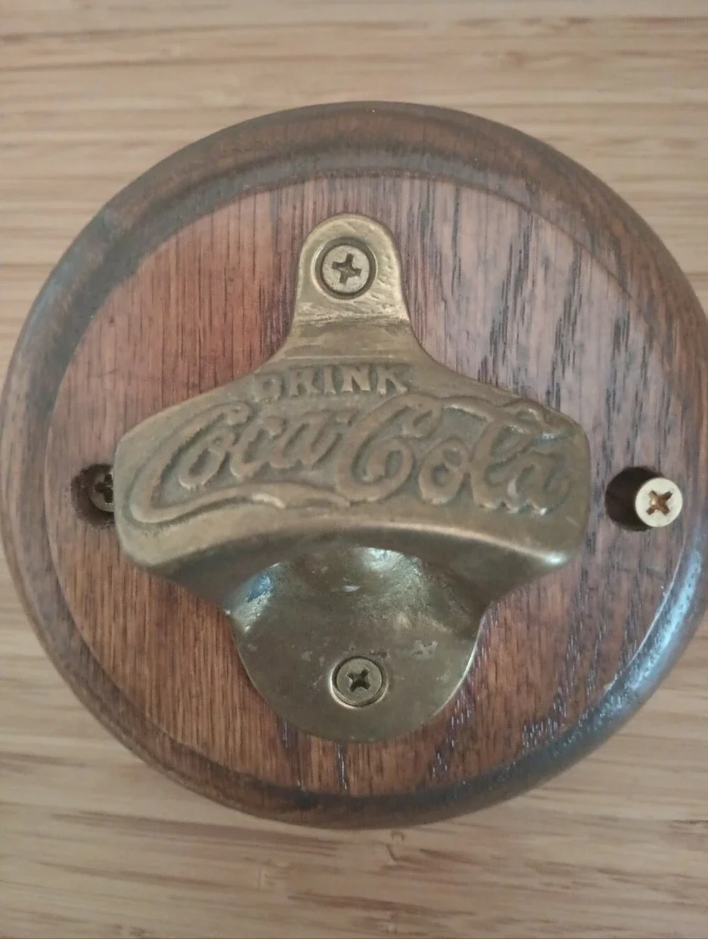 Coca-Cola Brass Wall Bottle Opener on Dark Oak Wood.  Screw Included